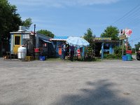 Having a hot-dog at the local greasy joint before heading down the road.