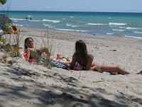 The girls sunbathing.